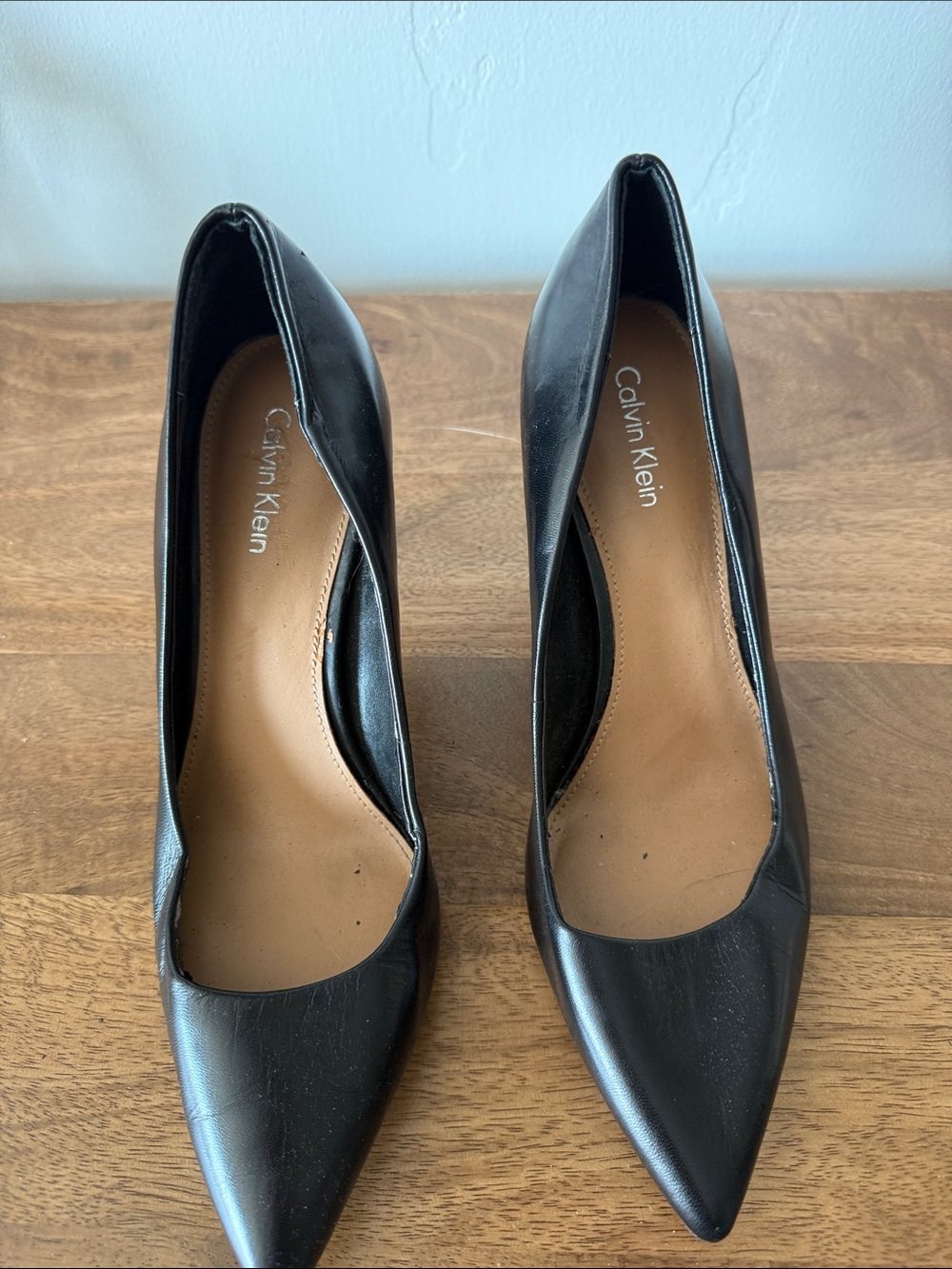 Need a rubber heel Calvin Klein Black Pointed Leather Pumps with Tan Insole